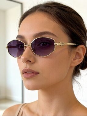 Miu Miu Gold Frame Sunglasses with Purple Lenses